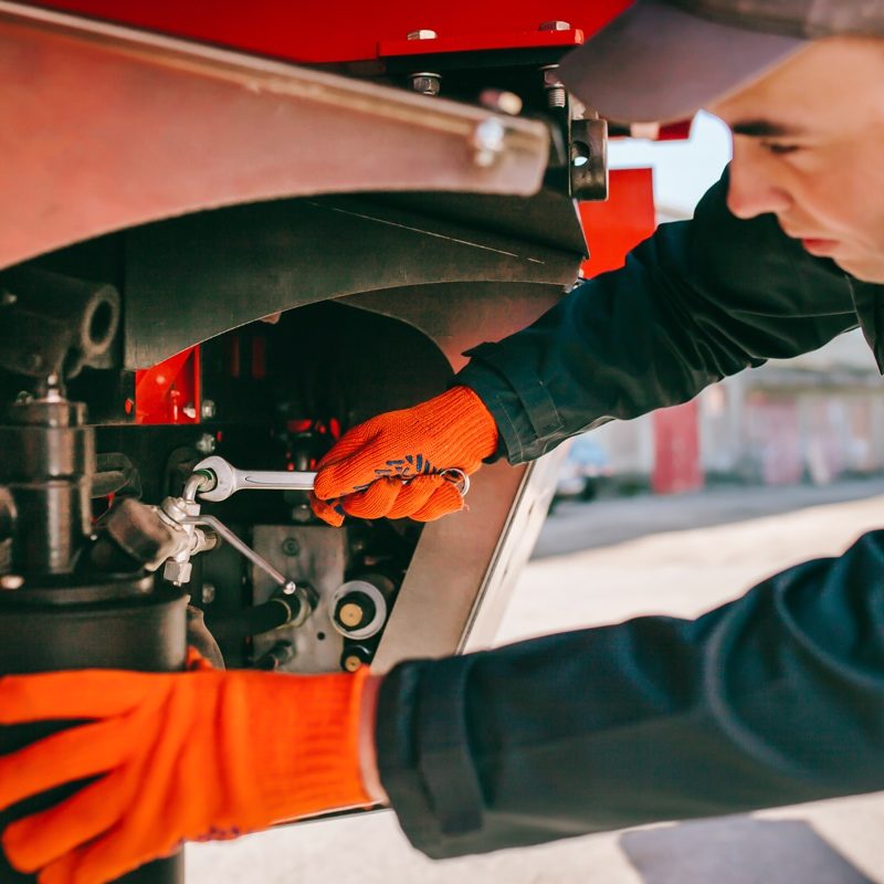 Rebuilders Enterprises - Closeup of Mechanic Working